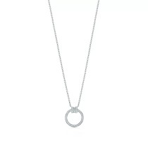 Tiffany T Diamond Pendant in White Gold with a Baguette Diamond