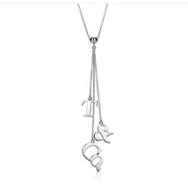 Tiffany T & Co. Letters Lariat Pendant On a 16" Chain